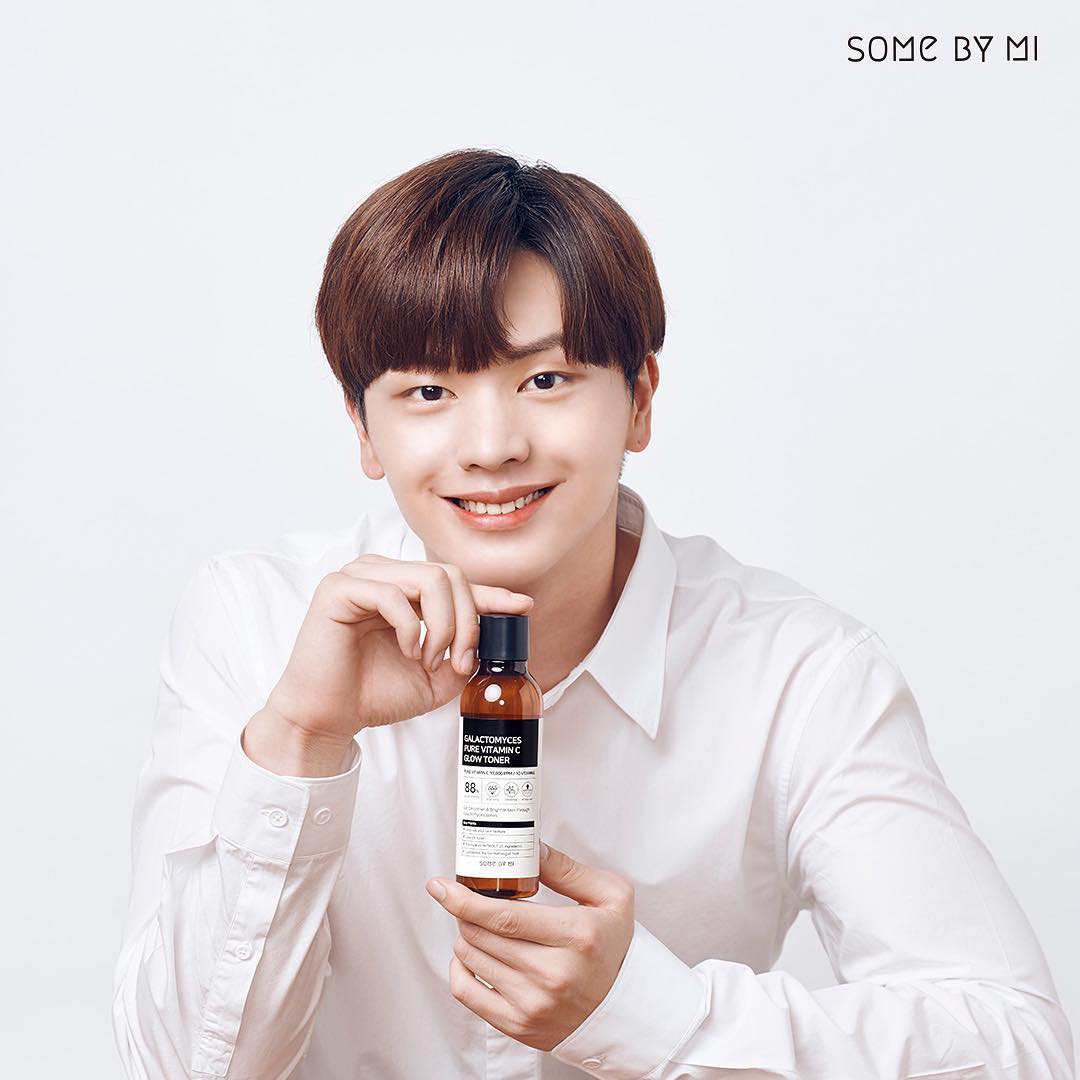 korean guy holding the toner